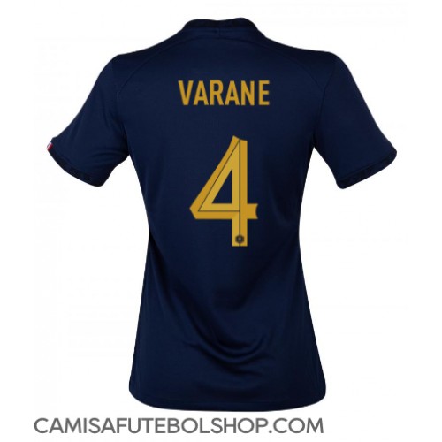 Camisa de time de futebol França Raphael Varane #4 Replicas 1º Equipamento Feminina Mundo 2022 Manga Curta
